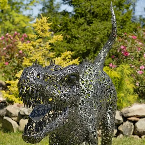 Zaer Ltd. 5.6 ft. Tall Crouching Tyrannosaurus Rex Outdoor Metal Statue “T-Bone” Metallic